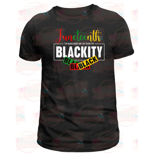 A black t-shirt with a bold design on the front that celebrates Juneteenth. It features the text “Juneteenth” at the top, followed by the playful and proud statement “I’m black every day, but today I’m blackity black black,” encapsulating Black American humor and pride in celebration of Juneteenth. - BozzUp Kustomz